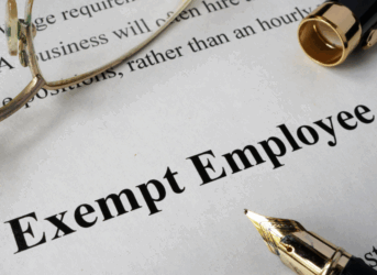 Exempt and Non-Exempt in Manufacturing Employees typed on a piece of paper