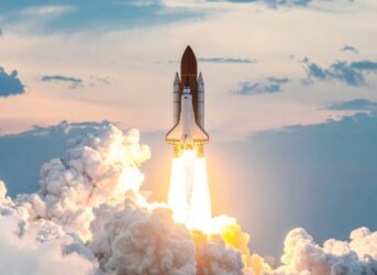 Aerospace engineering careers in demand: rocket launch against a clear blue sky